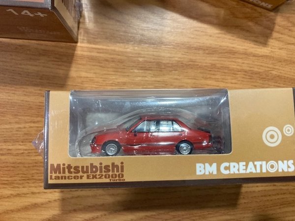 BM64B0211LHD BM Creations 1/64 Mitsubishi Lancer EX2000 Turbo, red